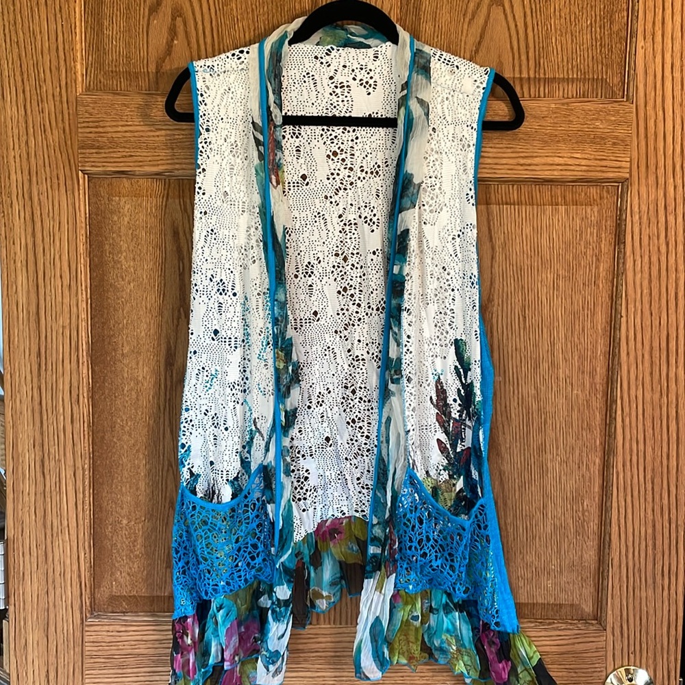 Edgy lace and sheer patterned vest